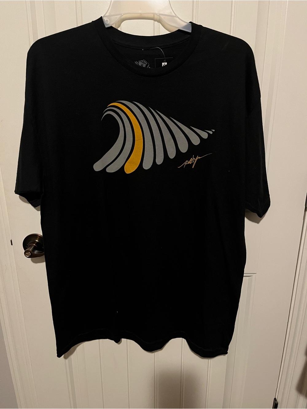 Rusty Black Short Sleeve Tee with Gray and Gold Wave Graphic